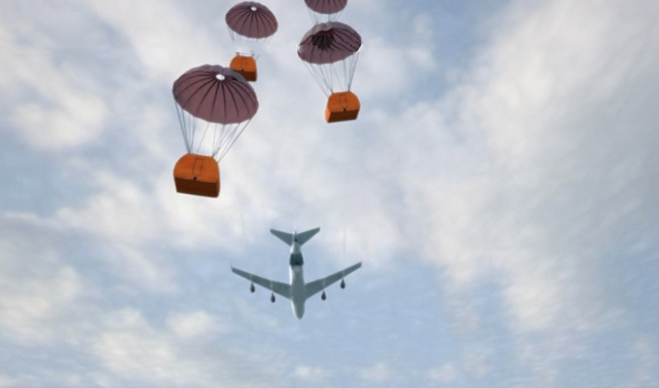 Vista de las cápsulas con los paracaídas ya abiertos una vez que éstas ya han sido eyectadas de la aeronave