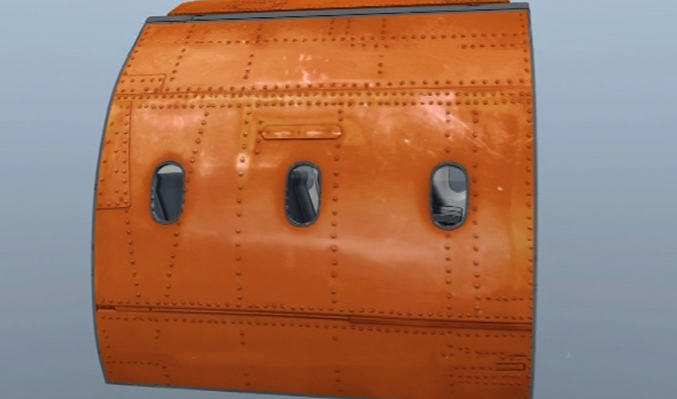 View of the side of a rescue capsule, the passenger seats inside can be seen through the windows.